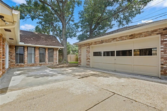 1029 Beverly Garden Dr, Metairie, LA 70002 - garage featuring concrete driveway
