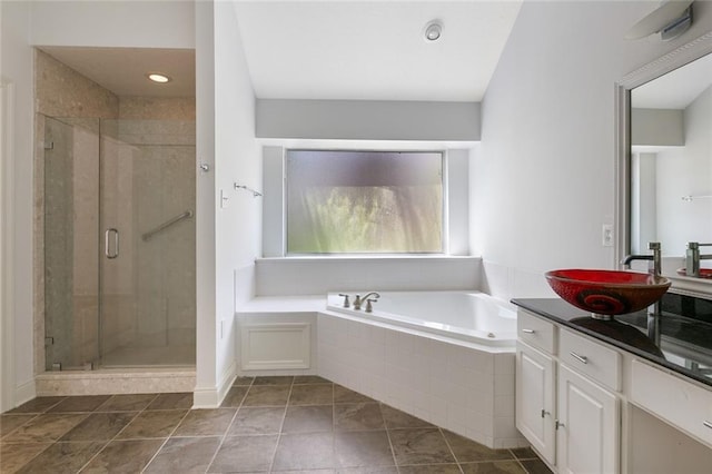 7218 Brookwood Dr, Mandeville, LA 70471 - bathroom featuring a garden tub, vanity, and a stall shower