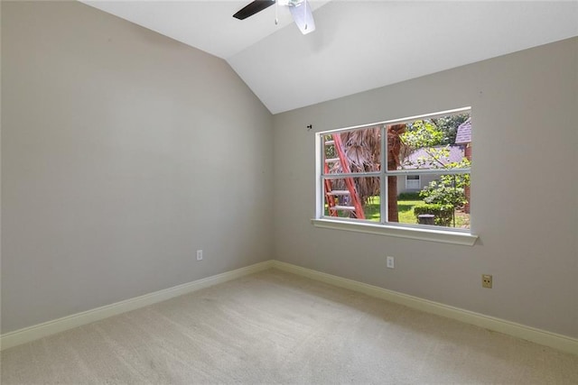 7218 Brookwood Dr, Mandeville, LA 70471 - carpeted spare room featuring a ceiling fan, vaulted ceiling, and baseboards