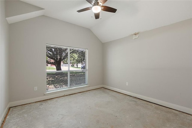 7218 Brookwood Dr, Mandeville, LA 70471 - spare room featuring ceiling fan, vaulted ceiling, baseboards, and unfinished concrete floors