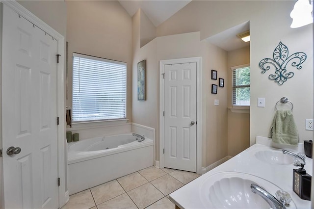 72158 Mill Rd, Abita Springs, LA 70420 - bathroom with a bath, lofted ceiling, tile patterned floors, and double vanity