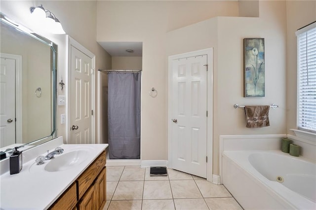 72158 Mill Rd, Abita Springs, LA 70420 - bathroom with a shower stall, vanity, a jetted tub, tile patterned flooring, and baseboards
