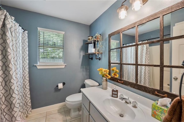 72158 Mill Rd, Abita Springs, LA 70420 - full bath with vanity, toilet, tile patterned floors, and a shower with shower curtain