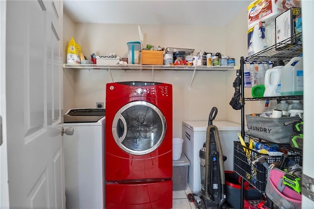 72158 Mill Rd, Abita Springs, LA 70420 - washroom featuring separate washer and dryer and tile patterned floors