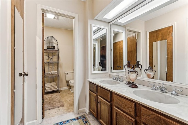 101 Lefleur Dr, Slidell, LA 70460 - bathroom with double vanity and tile patterned flooring