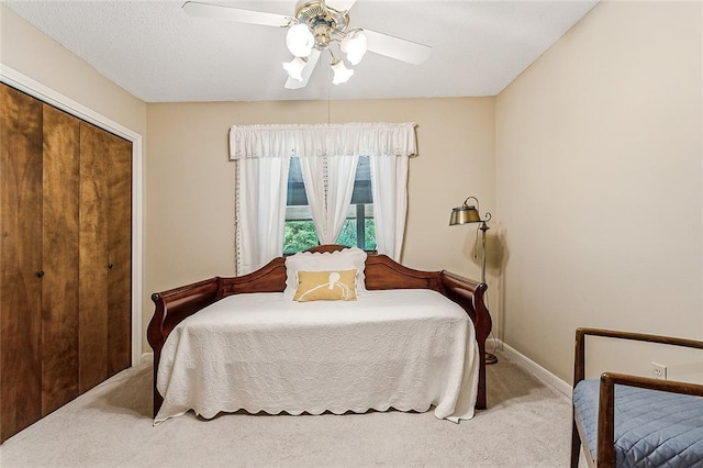 101 Lefleur Dr, Slidell, LA 70460 - bedroom with carpet floors, a closet, and ceiling fan