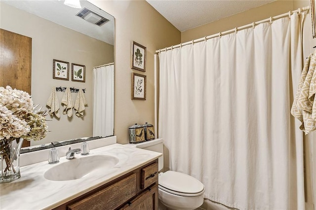 101 Lefleur Dr, Slidell, LA 70460 - full bathroom featuring vanity, a textured ceiling, and a shower with shower curtain