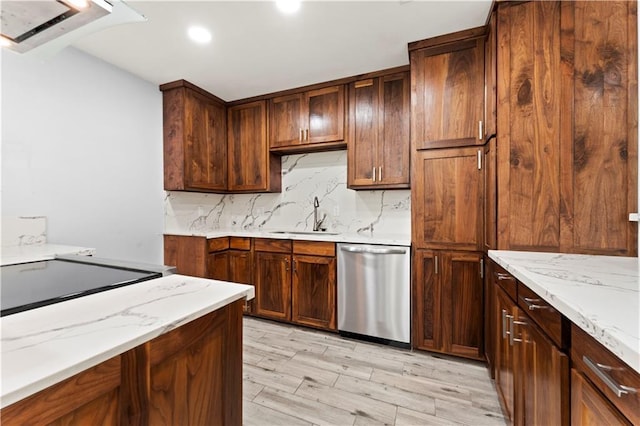 1037 Saint Joseph St, Slidell, LA 70460 - kitchen with dishwasher, a sink, tasteful backsplash, light stone counters, and light wood-style flooring