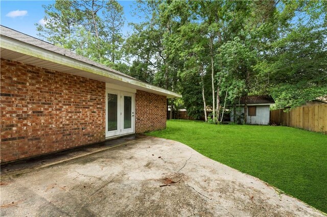 1037 Saint Joseph St, Slidell, LA 70460 - view of yard with french doors and a patio