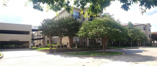6765 Corporate Blvd Unit 11102, Baton Rouge, LA 70809 - view of property with driveway