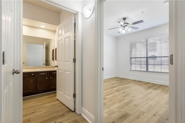 6765 Corporate Blvd Unit 11102, Baton Rouge, LA 70809 - hallway with light wood-style flooring and baseboards