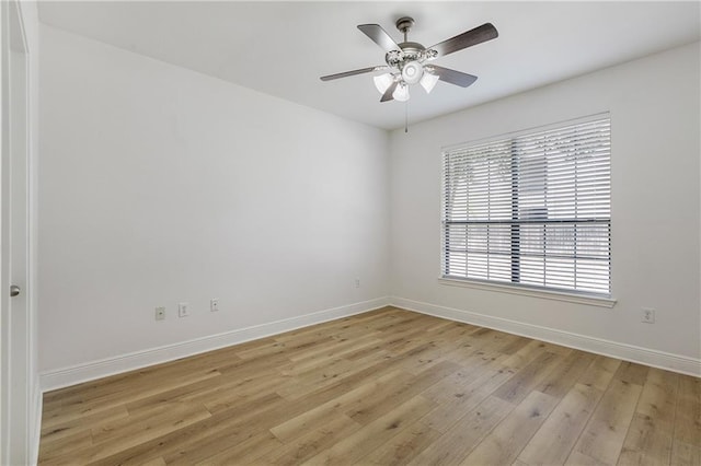 6765 Corporate Blvd Unit 11102, Baton Rouge, LA 70809 - empty room featuring baseboards, light wood-style floors, and a ceiling fan
