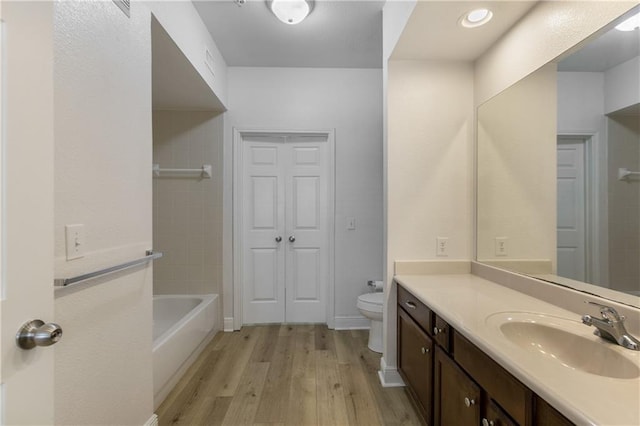6765 Corporate Blvd Unit 11102, Baton Rouge, LA 70809 - bathroom featuring wood finished floors and vanity