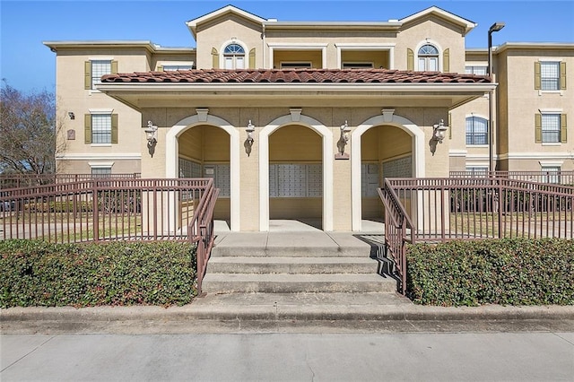 6765 Corporate Blvd Unit 11102, Baton Rouge, LA 70809 - view of front facade featuring covered porch and stucco siding