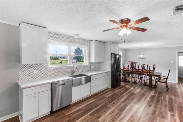 30425 Eden Church Rd, Denham Springs, LA 70726 - kitchen featuring dishwasher, a sink, freestanding refrigerator, ceiling fan, and tasteful backsplash