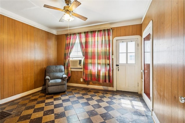 1706 Metairie Rd, Metairie, LA 70005 - living area featuring plenty of natural light, wood walls, cooling unit, a ceiling fan, and crown molding