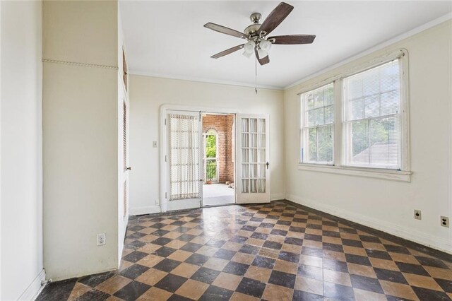 1706 Metairie Rd, Metairie, LA 70005 - unfurnished room with ornamental molding, ceiling fan, baseboards, and tile patterned floors