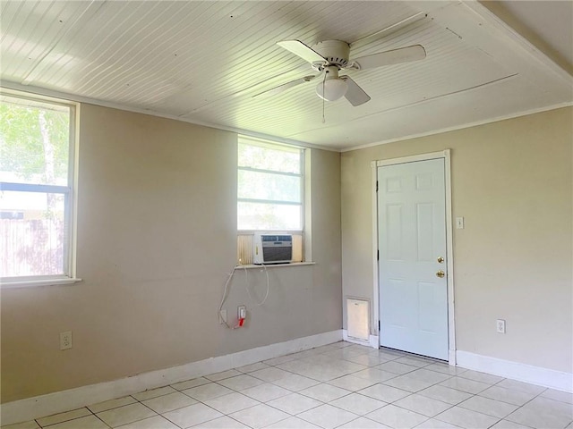 106 Matthews Dr, Slidell, LA 70458 - spare room with light tile patterned flooring, plenty of natural light, a ceiling fan, crown molding, and wood ceiling