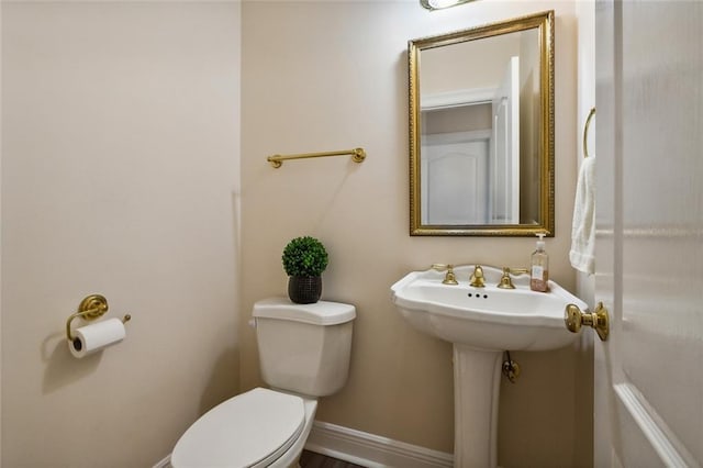 1715 Demosthenes St, Metairie, LA 70005 - half bath featuring toilet and baseboards