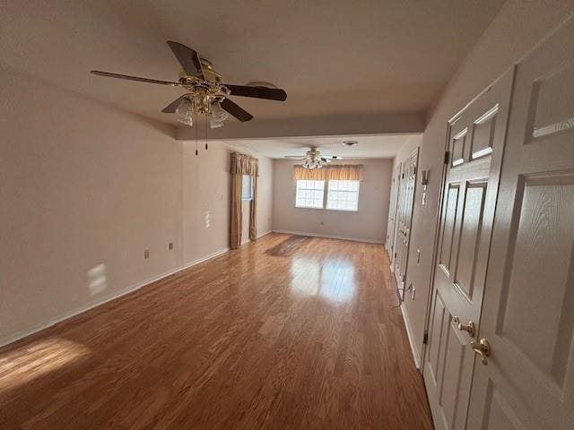 3107 Metairie Heights Ave, Metairie, LA 70002 - unfurnished room with wood finished floors, baseboards, and ceiling fan