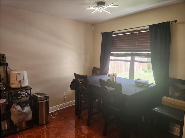 68 Camelia Trce, New Orleans, LA 70114 - dining area with a chandelier and baseboards