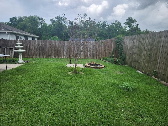 68 Camelia Trce, New Orleans, LA 70114 - view of yard featuring a fire pit