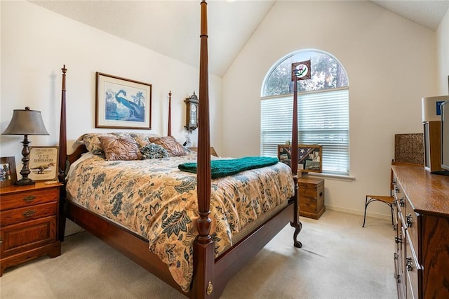 219 Bamboo Dr, Covington, LA 70433 - bedroom featuring light carpet, vaulted ceiling, and baseboards