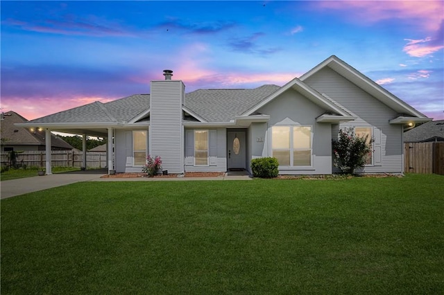 212 W Field Ct, Mandeville, LA 70471 - ranch-style home featuring a chimney, a carport, roof with shingles, and driveway