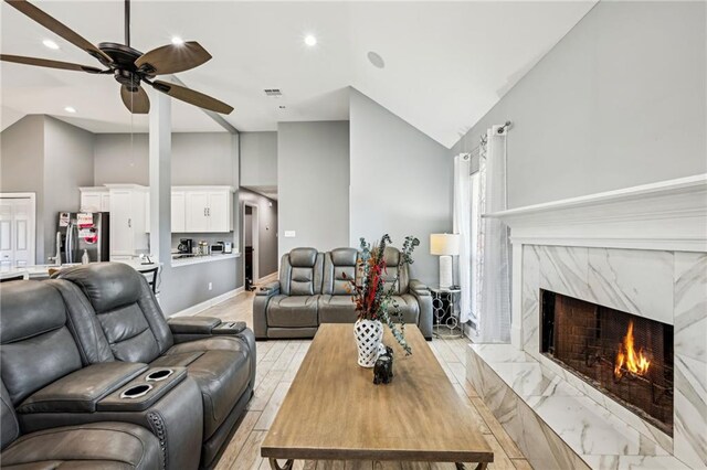 212 W Field Ct, Mandeville, LA 70471 - living room featuring ceiling fan, high vaulted ceiling, recessed lighting, and a premium fireplace