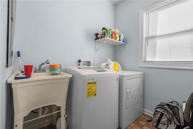 2634 Privateer Blvd, Barataria, LA 70036 - washroom featuring independent washer and dryer and brick patterned flooring