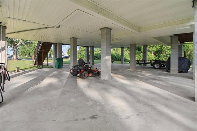 2634 Privateer Blvd, Barataria, LA 70036 - garage featuring a carport