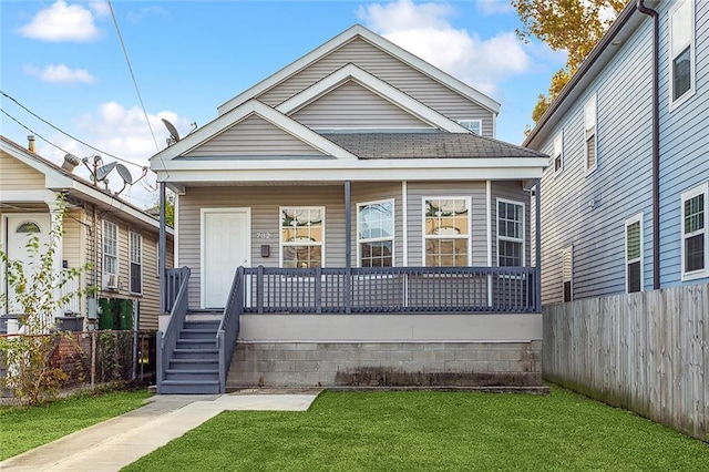 732 S Lopez St, New Orleans, LA 70119 - shotgun-style home featuring covered porch and roof with shingles