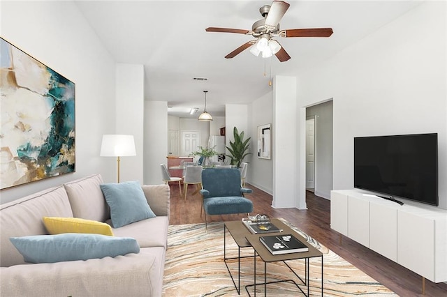 732 S Lopez St, New Orleans, LA 70119 - living area with wood finished floors and a ceiling fan