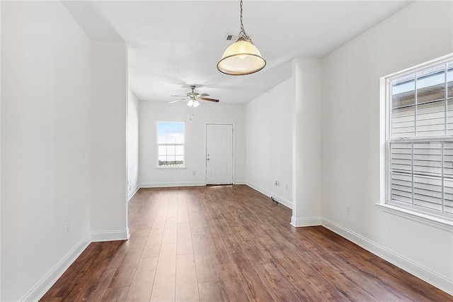 732 S Lopez St, New Orleans, LA 70119 - spare room featuring a ceiling fan and dark wood-style flooring