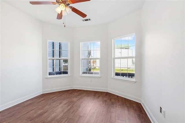 732 S Lopez St, New Orleans, LA 70119 - spare room with dark wood-style flooring and a ceiling fan