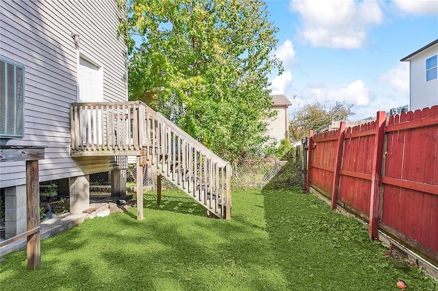 732 S Lopez St, New Orleans, LA 70119 - fenced backyard with stairway and a wooden deck
