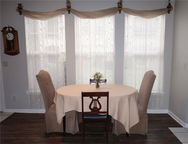 350 Emerald Forest Blvd Unit 17103, Covington, LA 70433 - dining room featuring a ceiling fan, wood finished floors, and healthy amount of natural light
