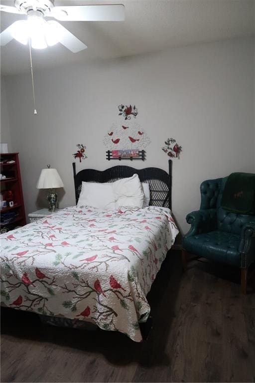 350 Emerald Forest Blvd Unit 17103, Covington, LA 70433 - bedroom with wood finished floors and a ceiling fan