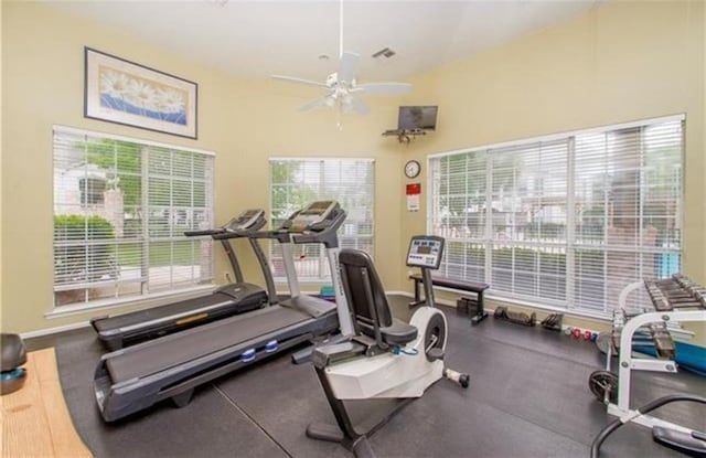 350 Emerald Forest Blvd Unit 17103, Covington, LA 70433 - exercise room featuring ceiling fan, healthy amount of natural light, and a high ceiling