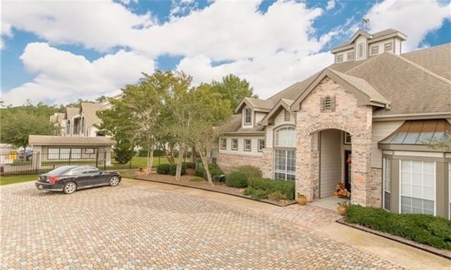 350 Emerald Forest Blvd Unit 17103, Covington, LA 70433 - view of front of house featuring stone siding