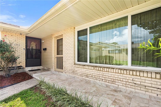 3513 Haring Rd, Metairie, LA 70006 - property entrance featuring brick siding