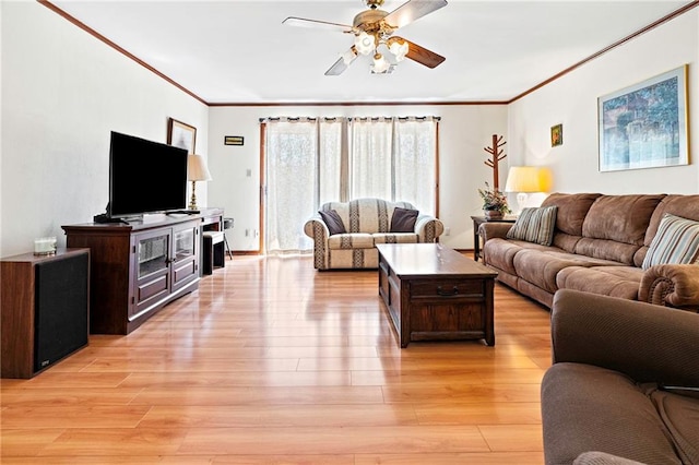 3513 Haring Rd, Metairie, LA 70006 - living area featuring crown molding, ceiling fan, and light wood-style flooring