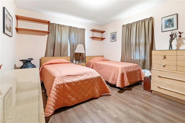 3513 Haring Rd, Metairie, LA 70006 - bedroom with wood finished floors