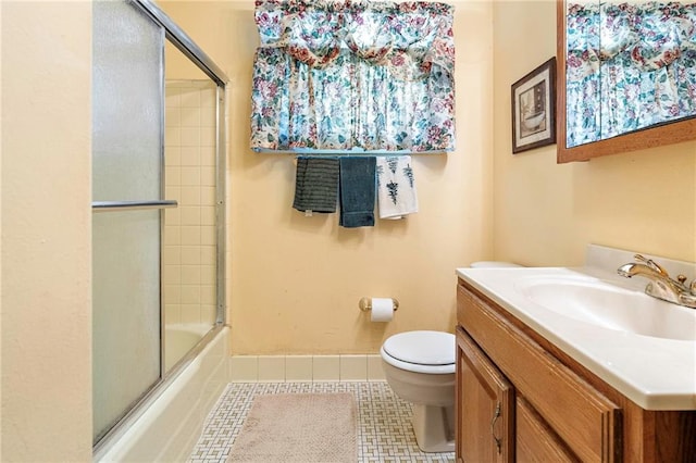 3513 Haring Rd, Metairie, LA 70006 - bathroom featuring tile patterned floors, vanity, and shower / bath combination with glass door