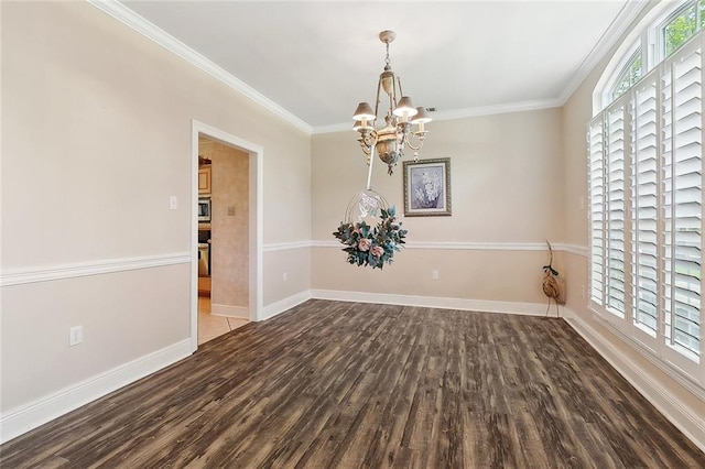 1424 Woodmere Dr, Mandeville, LA 70471 - spare room featuring wood finished floors, a chandelier, crown molding, and baseboards