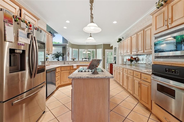 1424 Woodmere Dr, Mandeville, LA 70471 - kitchen featuring appliances with stainless steel finishes, a peninsula, ornamental molding, backsplash, and a center island