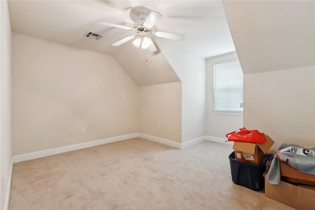 1424 Woodmere Dr, Mandeville, LA 70471 - bonus room featuring carpet flooring, vaulted ceiling, baseboards, and ceiling fan