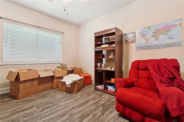 1424 Woodmere Dr, Mandeville, LA 70471 - sitting room featuring wood finished floors, ceiling fan, and baseboards