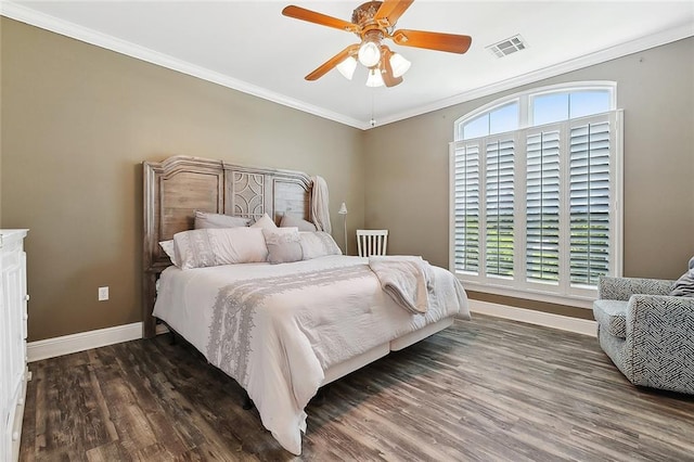 1424 Woodmere Dr, Mandeville, LA 70471 - bedroom with baseboards, ornamental molding, wood finished floors, and ceiling fan