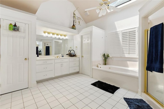1424 Woodmere Dr, Mandeville, LA 70471 - full bathroom featuring a ceiling fan, vanity, tile patterned flooring, a bath, and lofted ceiling